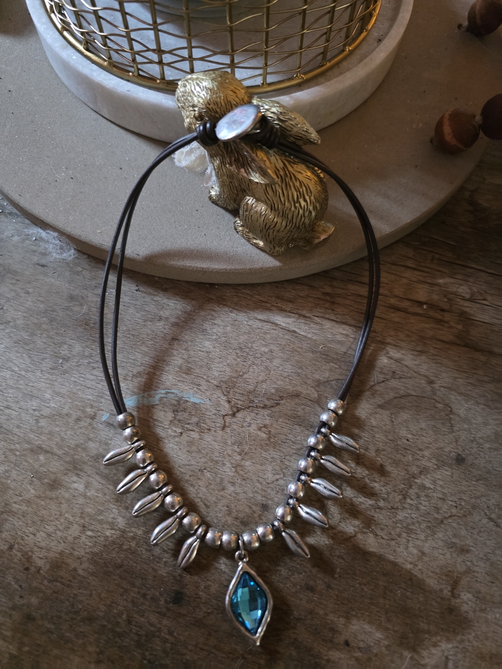 Silver-Tone Leather Necklace with Blue Teardrop Gem